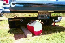 Mr. Tommy forgot to look under his truck before he let the jack down..  
